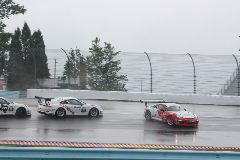 Illustration for article titled Standing Water Causes Mass 911 GT3 Cup Spin-Out At First Turn Of Race